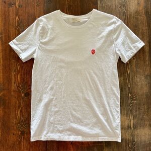 Suspicious Antwerp White Short Sleeve Tee with Red Skull Logo Print